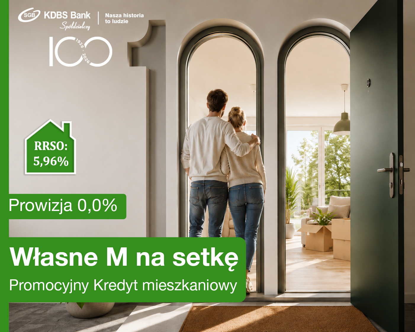 Reklama promocyjnego kredytu mieszkaniowego. Grafika przedstawia przytulającą się parę, która oparta o framugę drzwi patrzy na swoje nowe mieszkanie.